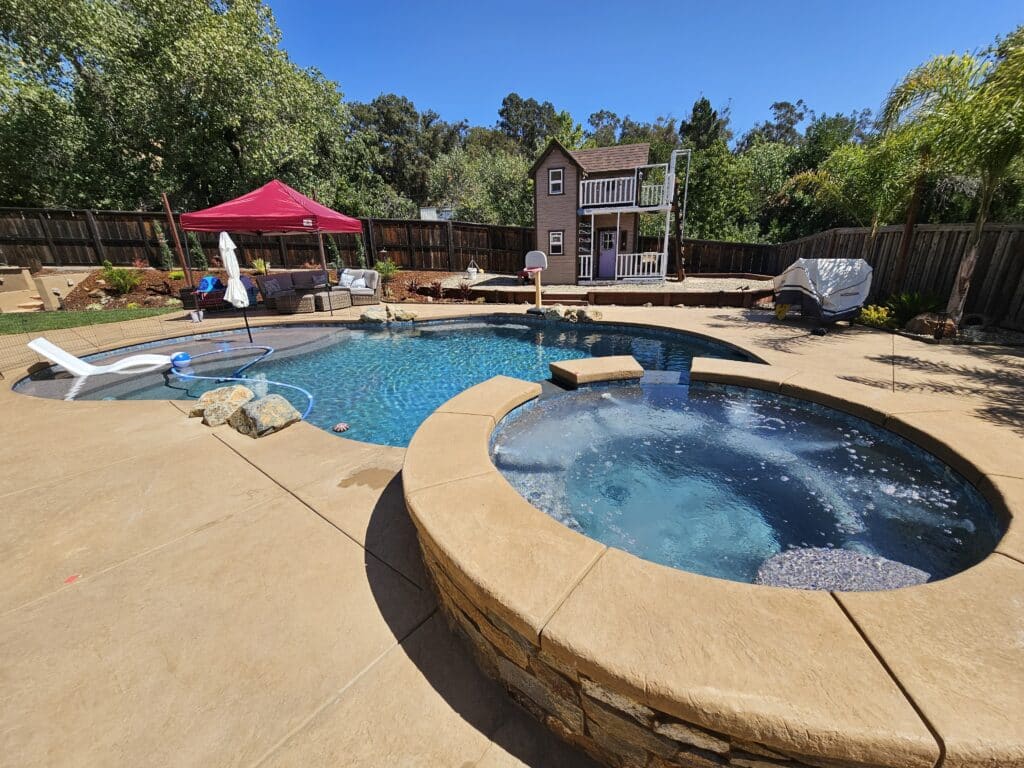 Backyard pool with spa and gazebo