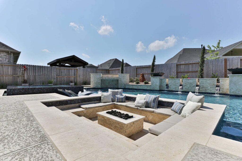 Modern pool with fire pit area