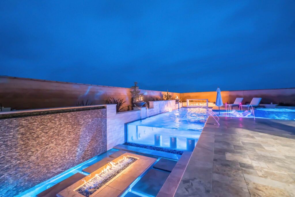 Illuminated pool at night.