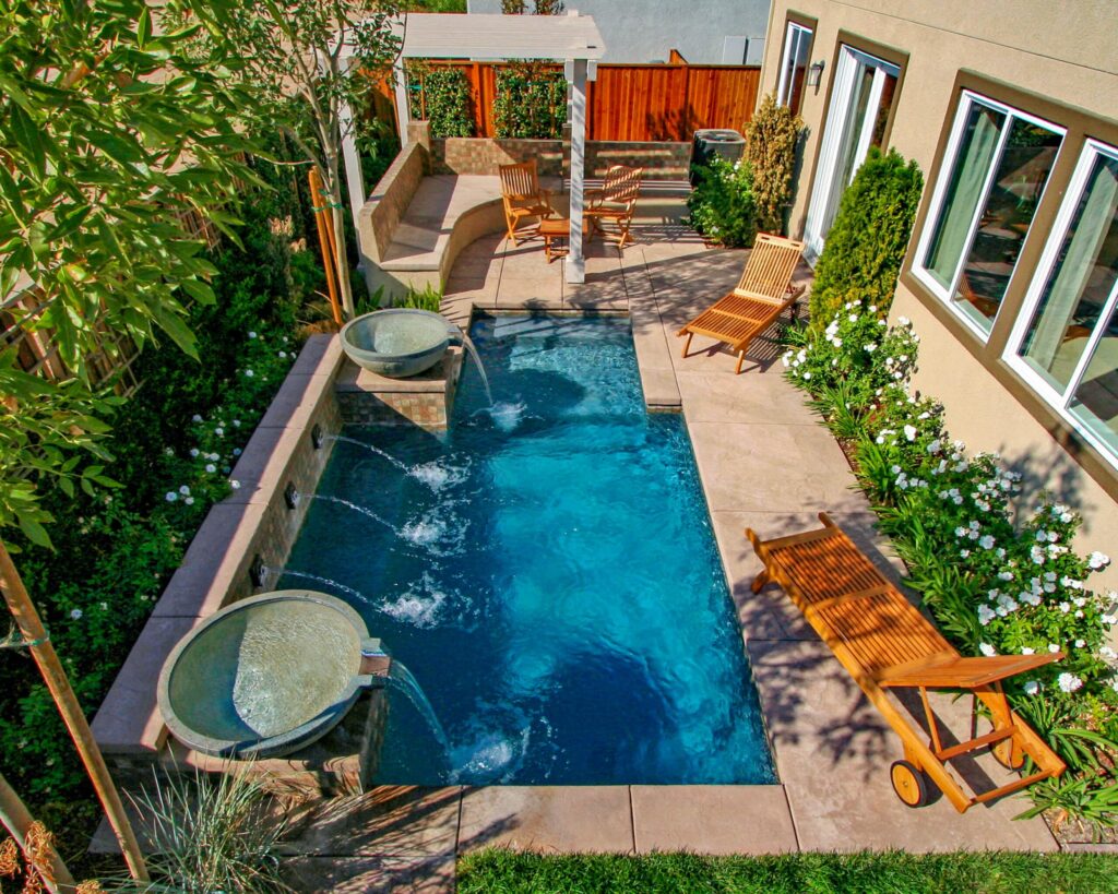 Serene backyard pool with seating