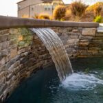 Waterfall flowing into a pool.