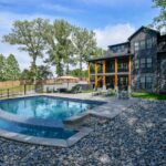 Modern house with pool and trees