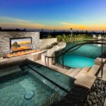 Luxury pool with sunset view.